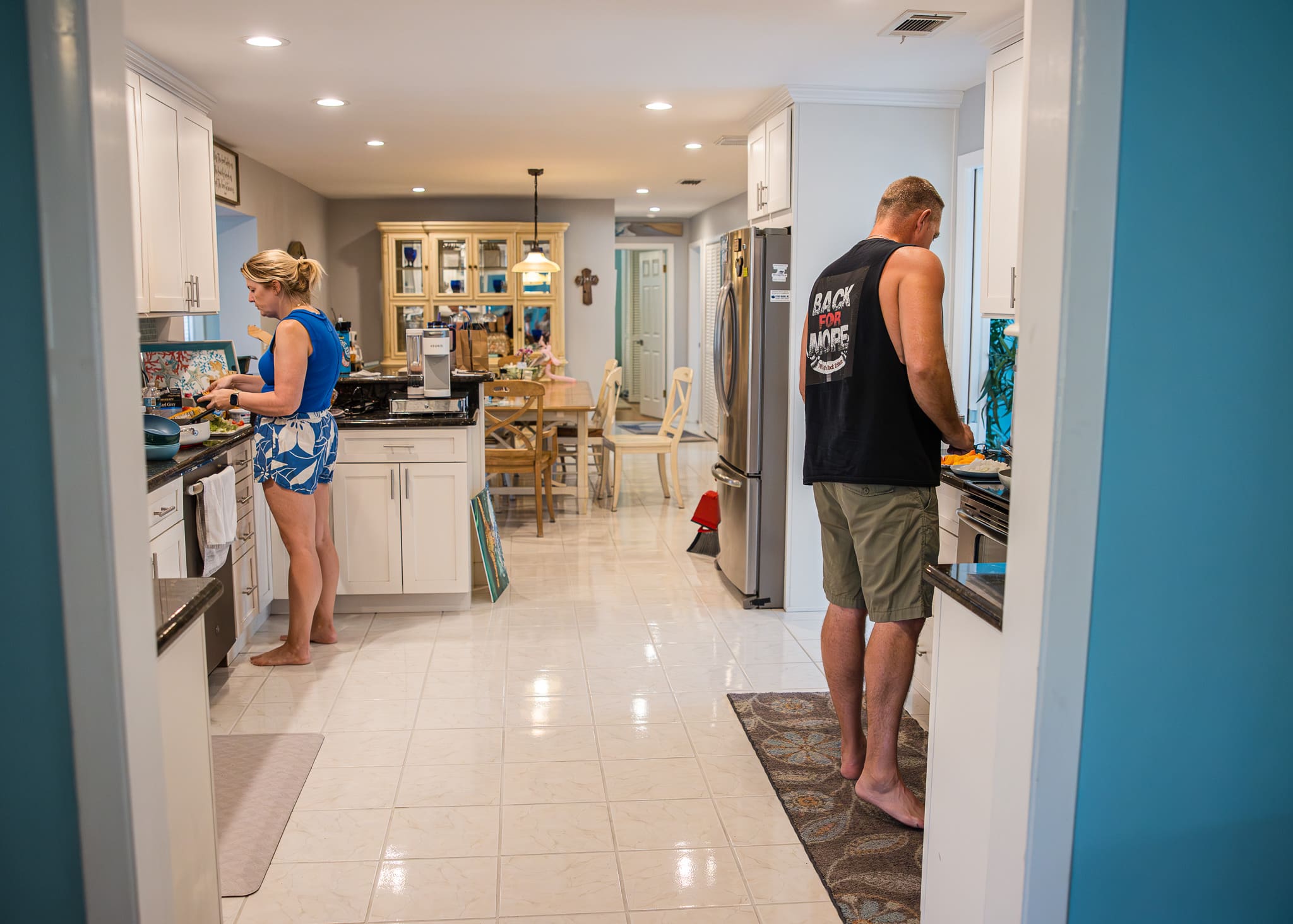 Husband & wife cooking in the kitchen