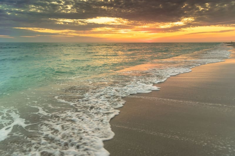 Sunset waves rolling onto Bowman’s Beach, one of the best beaches near Cape Coral for quiet evenings.