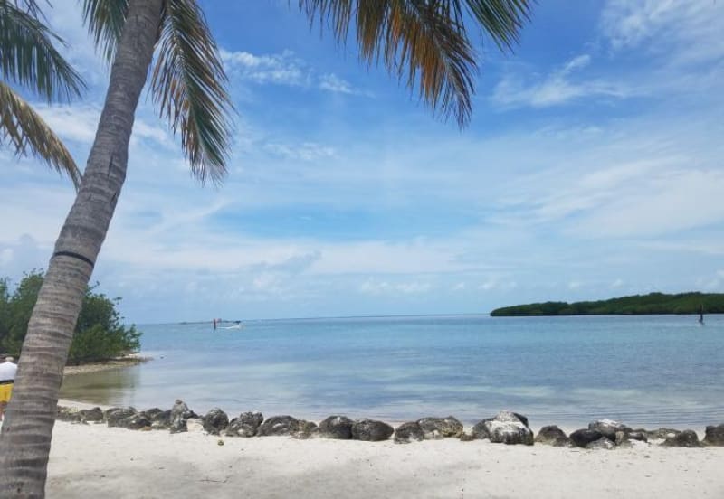 Quiet beach and gentle water at Lovers Key State Park, among the best beaches near Cape Coral.