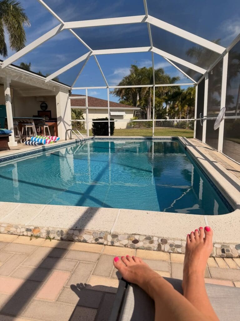 Cape Coral Vacation Rentals with screened pool, sunny lanai, and relaxing poolside view for quiet days